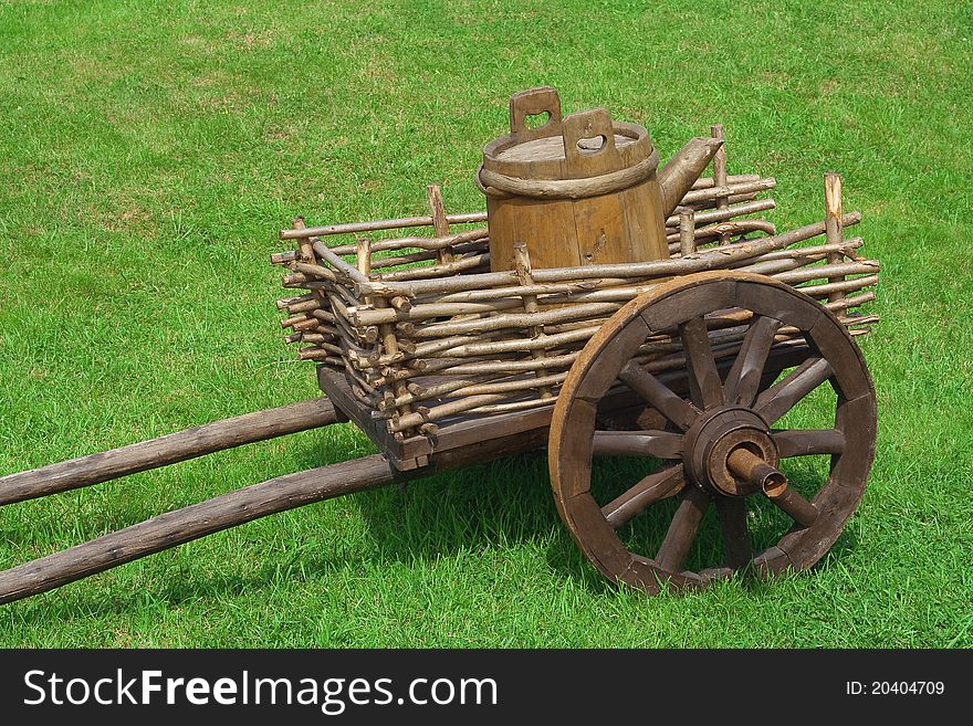 Country wagon with a barrel, which serves to transport water. Country wagon with a barrel, which serves to transport water