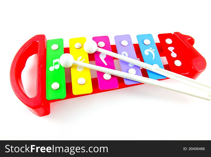 Toy colorful xylophone on white background