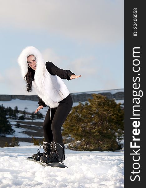 Girl with snowboard