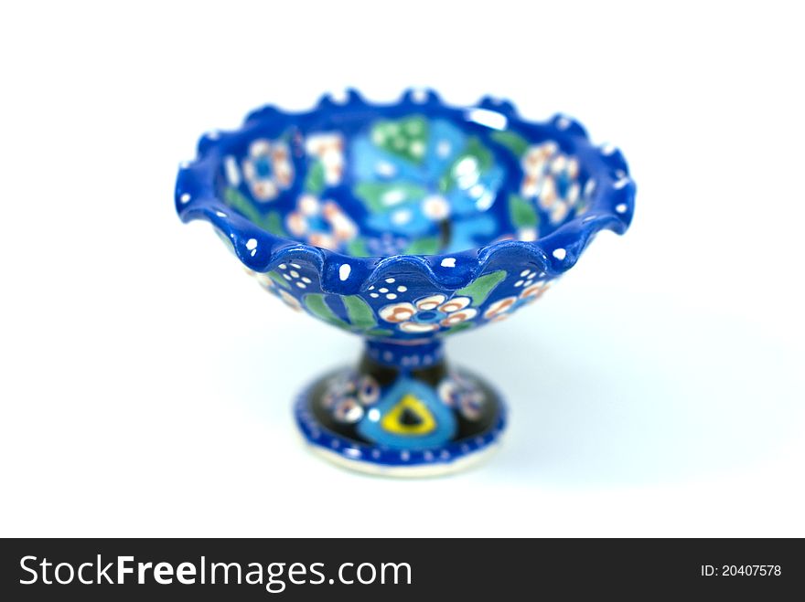 Turkish ceramic blue sugar bowl on the white