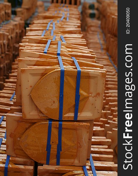 Piles of clay roof tile at a buddhist temple in Bangkok. Piles of clay roof tile at a buddhist temple in Bangkok