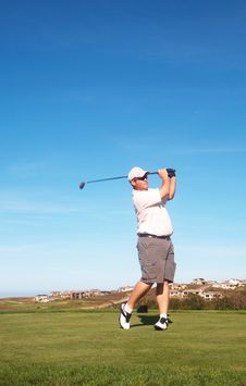 Young Male Golfer Playing Off The Tee Box Royalty Free Stock Image