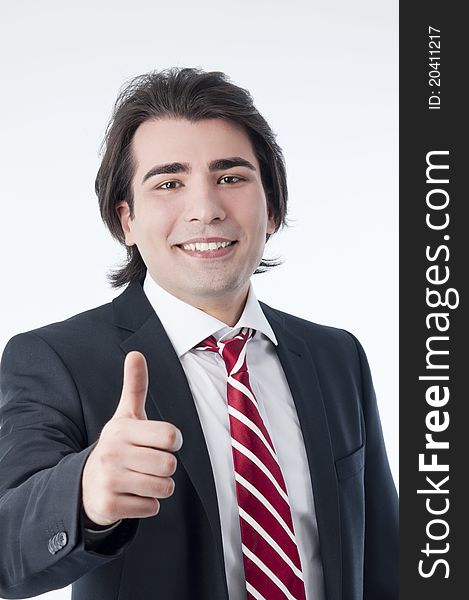 Man gesturing ok success sign isolated over white.