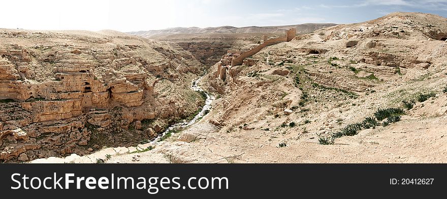 Travel at spring in judean desert for hermits caves and monk monastery