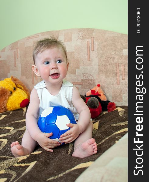 Lovely little girl plays with ball. Lovely little girl plays with ball