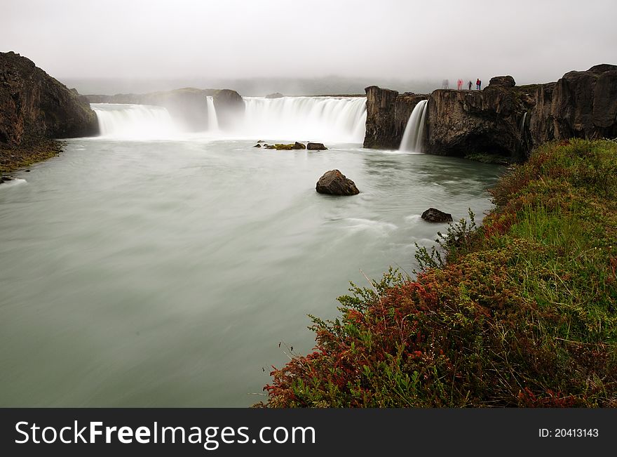 The Godafoss is one of the most spectacular waterfalls in Iceland. It is located in the MÃ½vatn district of North-Central Iceland at the beginning of the Sprengisandur highland road. The water of the river SkjÃ¡lfandafljÃ³t falls from a height of 12 meters over a width of 30 meters. The Godafoss is one of the most spectacular waterfalls in Iceland. It is located in the MÃ½vatn district of North-Central Iceland at the beginning of the Sprengisandur highland road. The water of the river SkjÃ¡lfandafljÃ³t falls from a height of 12 meters over a width of 30 meters