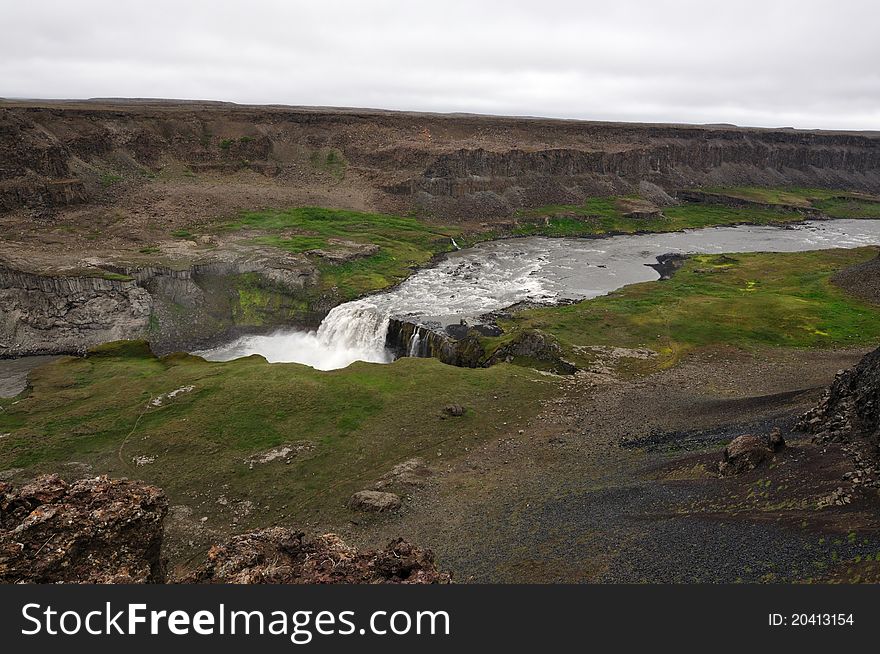 Hafragilsfoss waterfall in Iceland. The waterfall flows downstream from Dettifoss within the depths of the Jökulságljúfur canyon