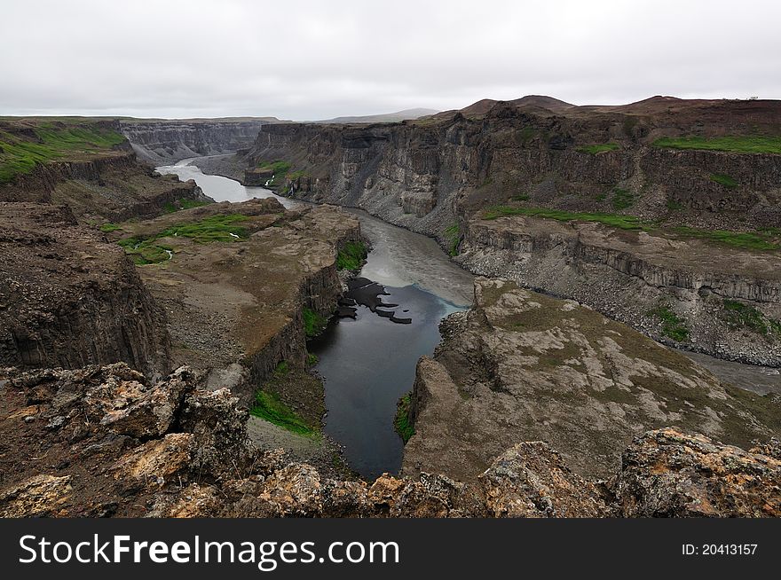 Hafragilsfoss waterfall in Iceland. The waterfall flows downstream from Dettifoss within the depths of the JÃ¶kulsÃ¡gljÃºfur canyon