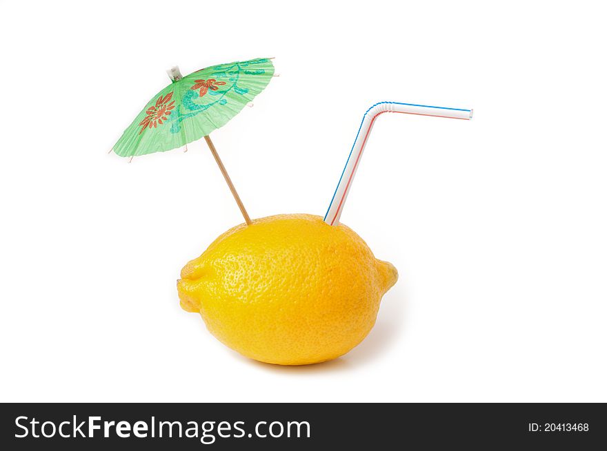 Cocktail with lemon with straw and umbrella on a white background