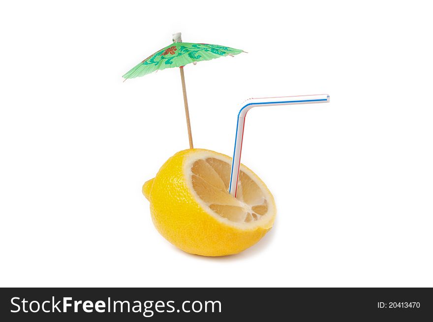 Cocktail with lemon with straw and umbrella on a white background