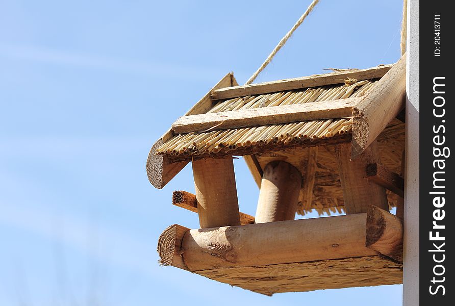 Bird feeder hanging on the wall. Bird feeder hanging on the wall.