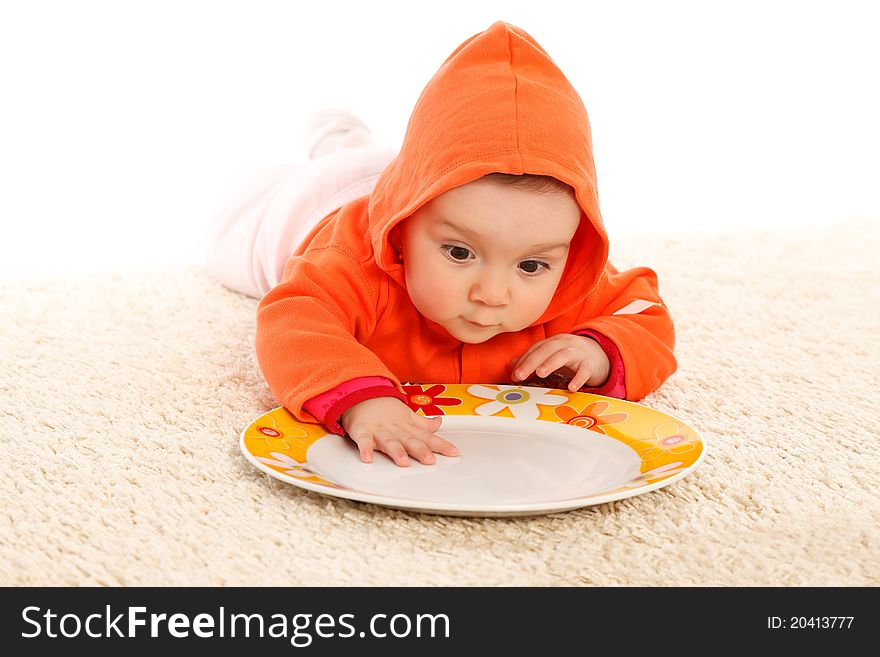 Little girl searching food in the plate. Little girl searching food in the plate