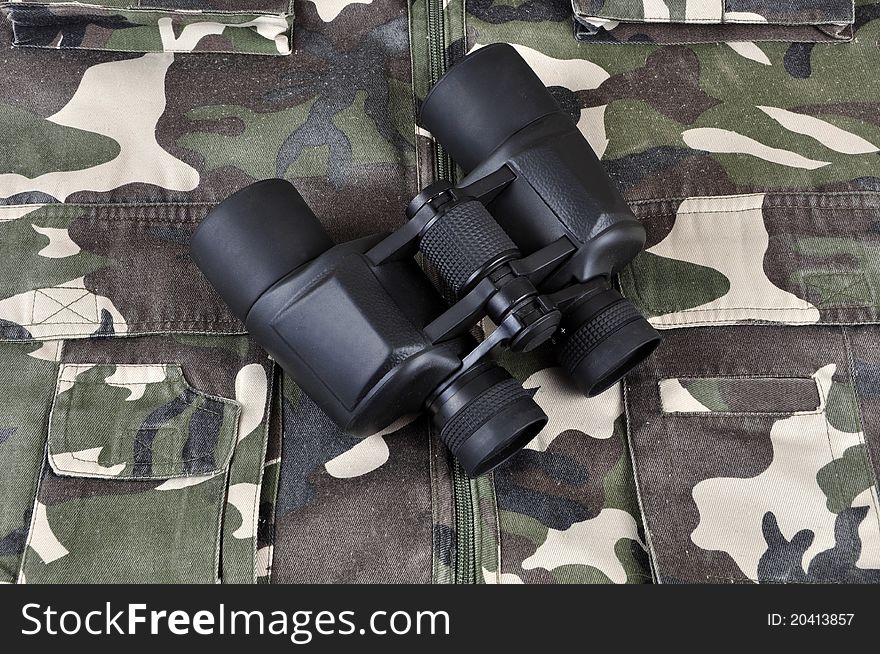 A binocular, photographed in a studio. A binocular, photographed in a studio.