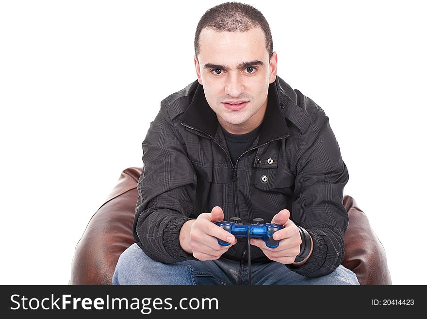 Young man with a joystick for game console