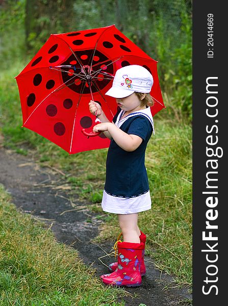 Little Girl With An Umbrella