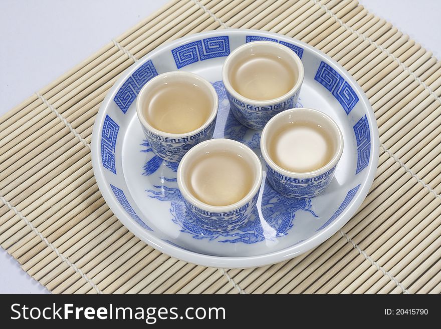 Traditional chinese Tea cup on bamboo matt. Traditional chinese Tea cup on bamboo matt