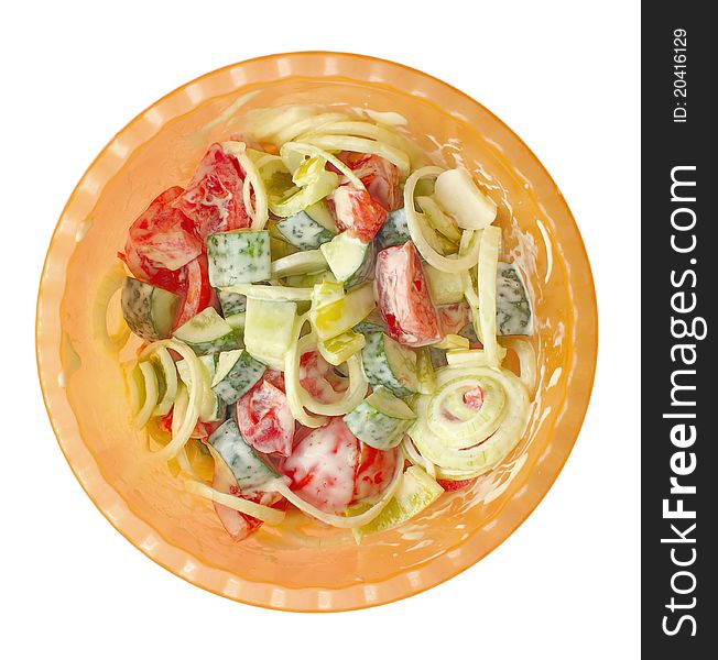 Isolated photo bowls with a summer salad of cucumber, tomato, onion, bell pepper, seasoned mayonnaise.