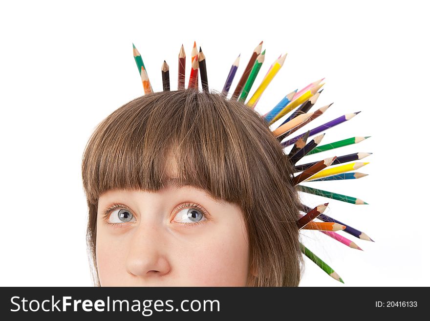 Girl with pencils isolated on a white background