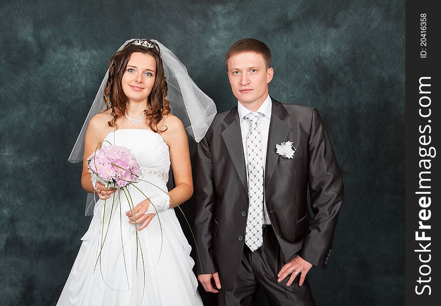 Portrait Loving bride and groom in studio