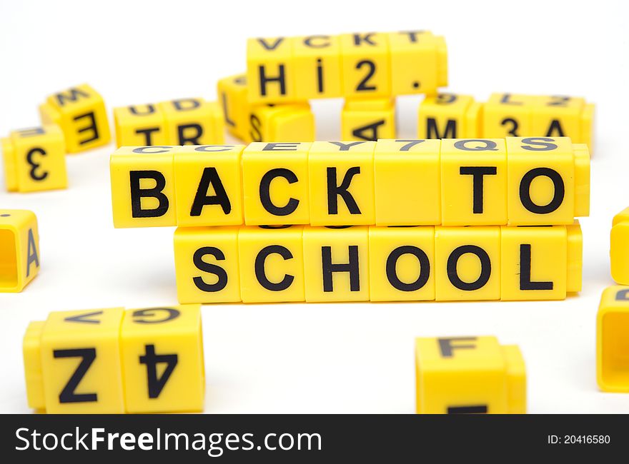 An image of yellow bricks with words ''back to school'' on them