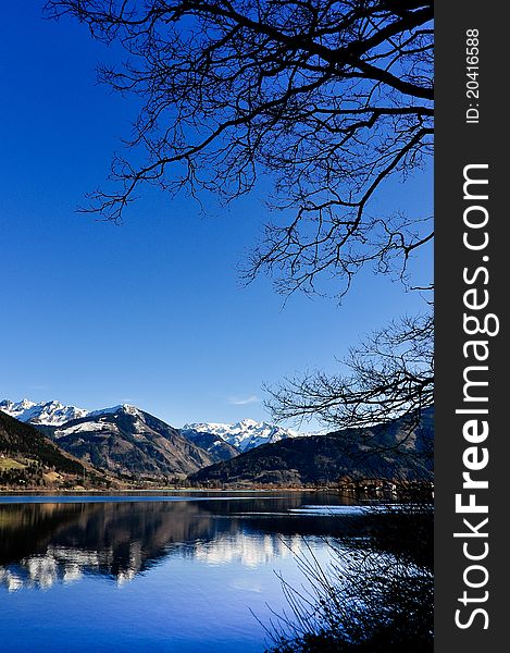 Mountain view with lake reflection in Alps, Europe