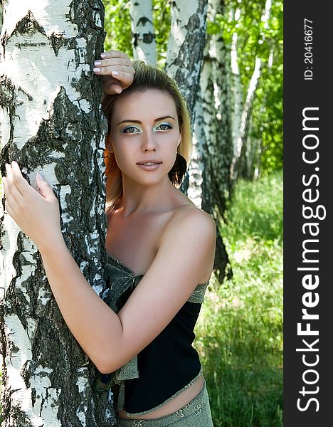 Girl's portrait in a birch grove. Girl's portrait in a birch grove