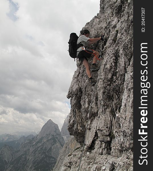 Tourists on sierra trail in Julian Alps