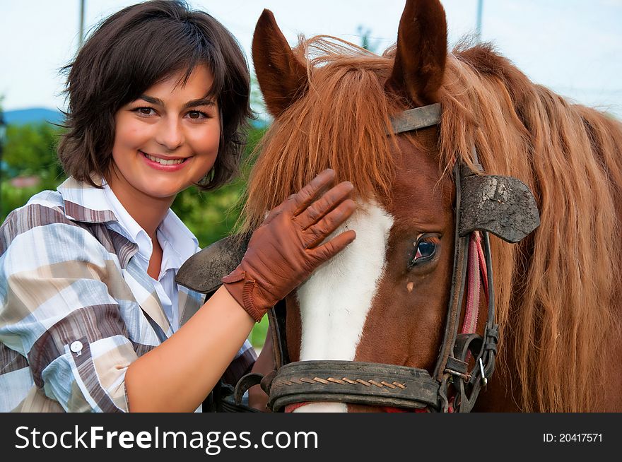 Beautiful girl and her handsome horse