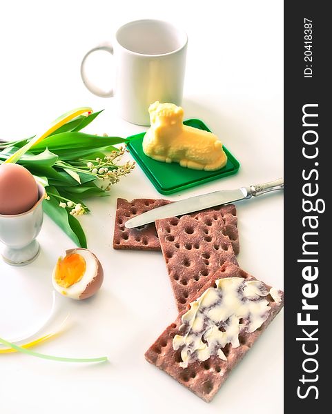 Breakfast with decorative butter and crackers