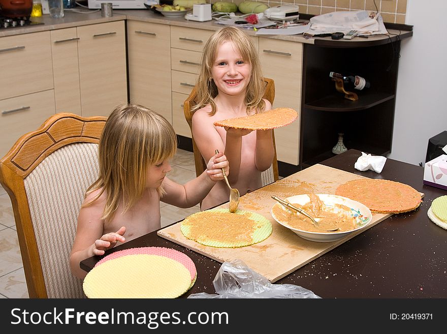 Young Girls Baking In The Kitchen