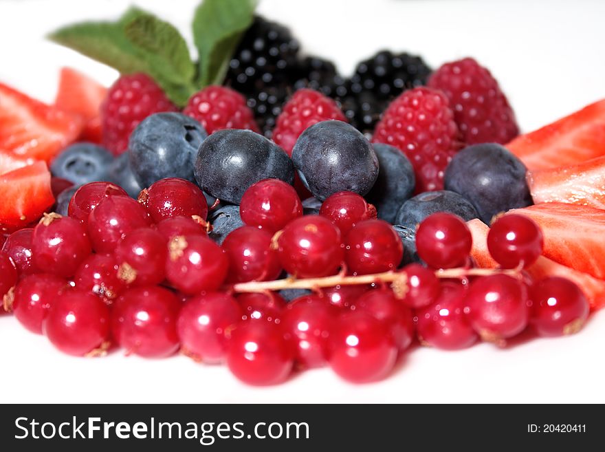 Tasty, fresh, bright, ripe wild and garden berries closeup