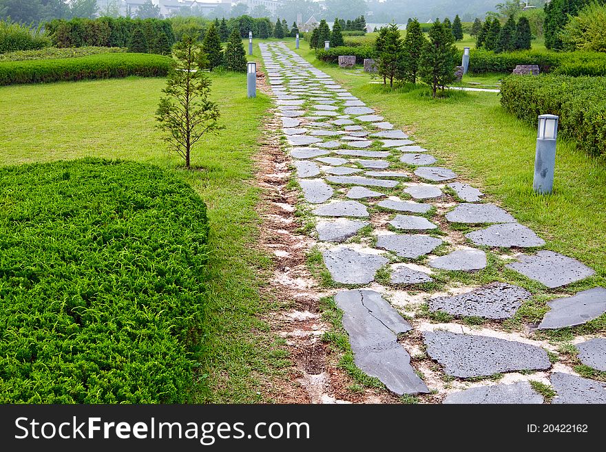 Garden path paved with a natural stone