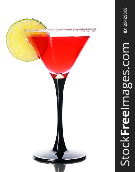 Red cocktail with lime isolated on white. Red cocktail with lime isolated on white