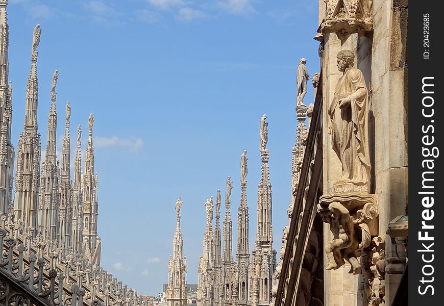 Milan's dome, the most famous monument of the city. The roof is a forest of white statues. Milan's dome, the most famous monument of the city. The roof is a forest of white statues.