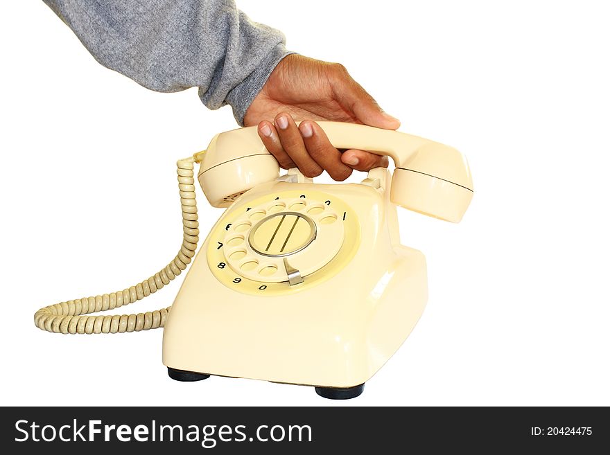 The hands of the men are picking up the traditional telephone. The hands of the men are picking up the traditional telephone.