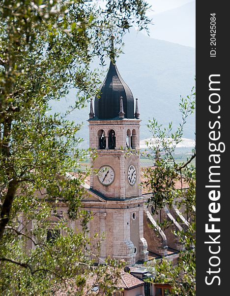 The old church's bell tower with clocks of Arco - Trentino / Italy. The old church's bell tower with clocks of Arco - Trentino / Italy