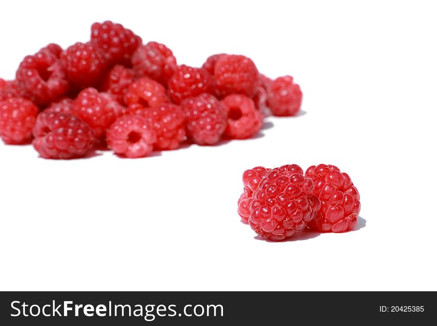 Fresh, juicy and healthy raspberries, red on white. Fresh, juicy and healthy raspberries, red on white