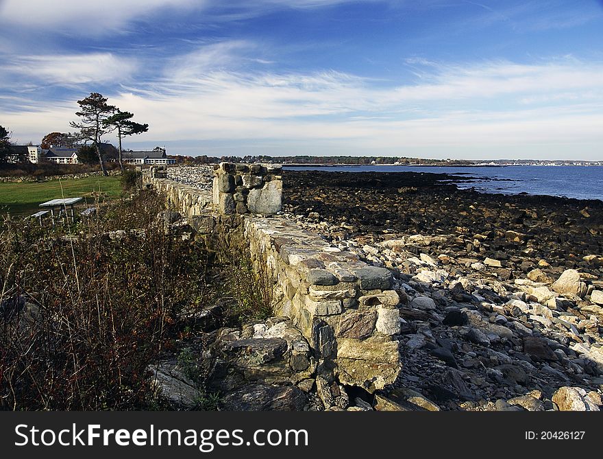 A rock wall built beside the ocean