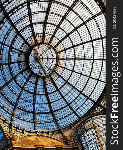 The Galleria Vittorio Emanuele II is a covered double arcade formed of two glass-vaulted arcades at right angles intersecting in an octagon, prominently sited on the northern side of the Piazza del Duomo in Milan. The Galleria Vittorio Emanuele II is a covered double arcade formed of two glass-vaulted arcades at right angles intersecting in an octagon, prominently sited on the northern side of the Piazza del Duomo in Milan.