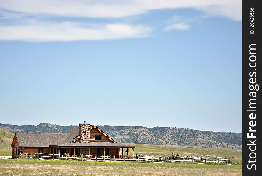 Summer Log Cabin And Yard In The Hills