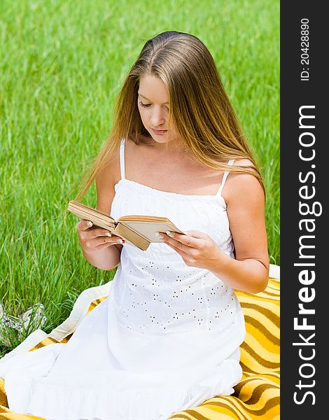 Young Girl Reading Book