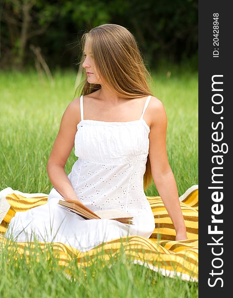 Young girl reading book