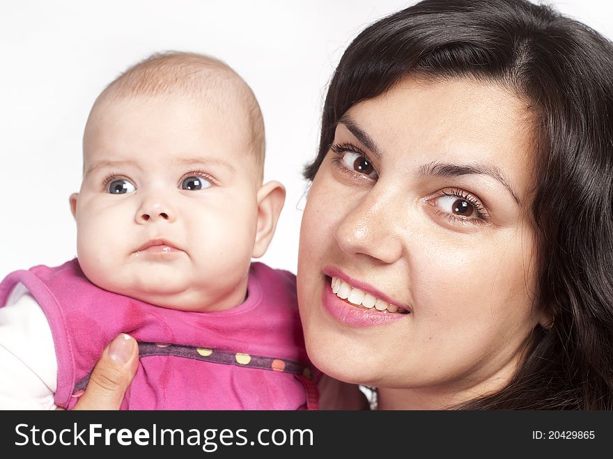 Portrait of a cute mom with baby. Portrait of a cute mom with baby
