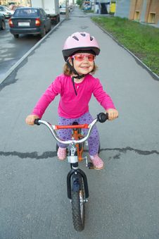 Girl On Bike Stock Photography