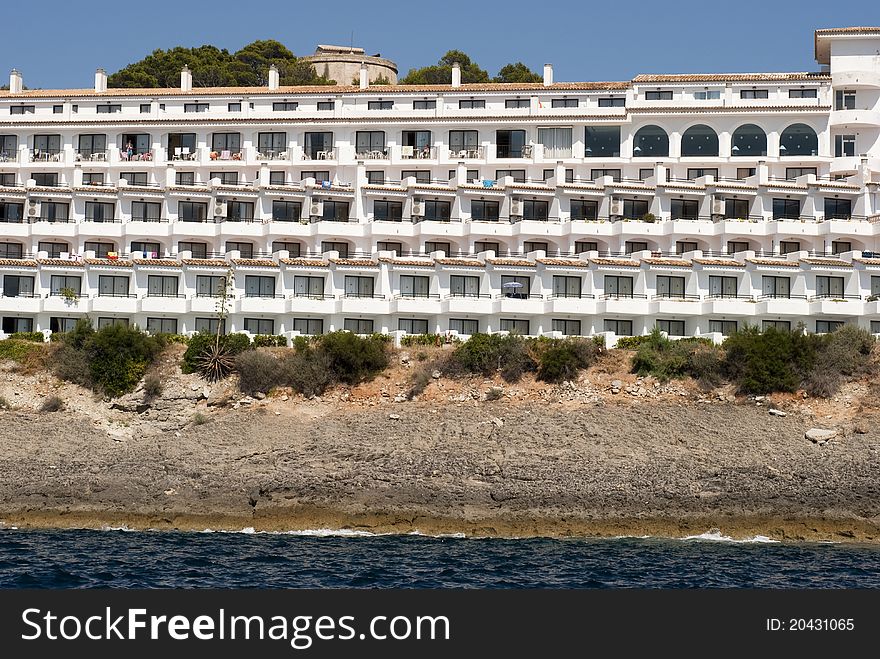 Hotel facade close to the Mediterranean Sea a summer day on Majorca in Spain. Hotel facade close to the Mediterranean Sea a summer day on Majorca in Spain.