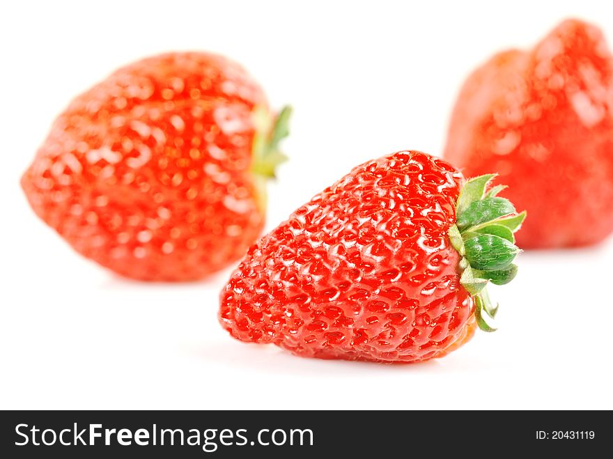 Fresh and tasty strawberries with white background.