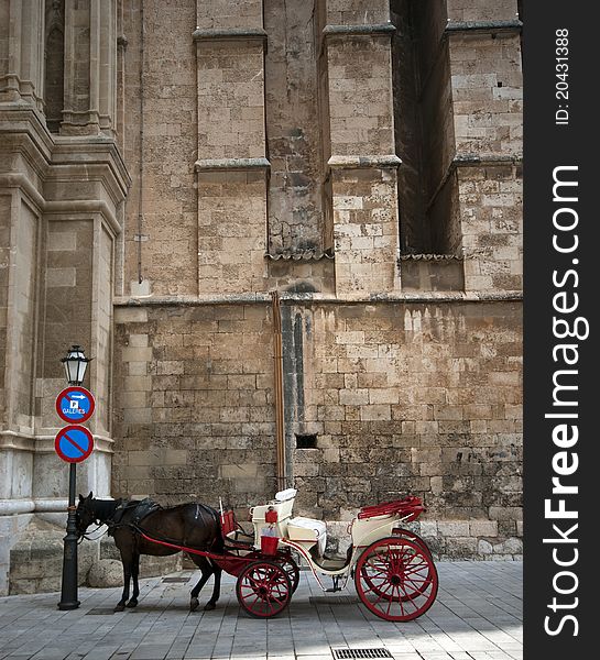 Horse carriage stop outside Palma de Majorca town Cathedral in Spain. Horse carriage stop outside Palma de Majorca town Cathedral in Spain.