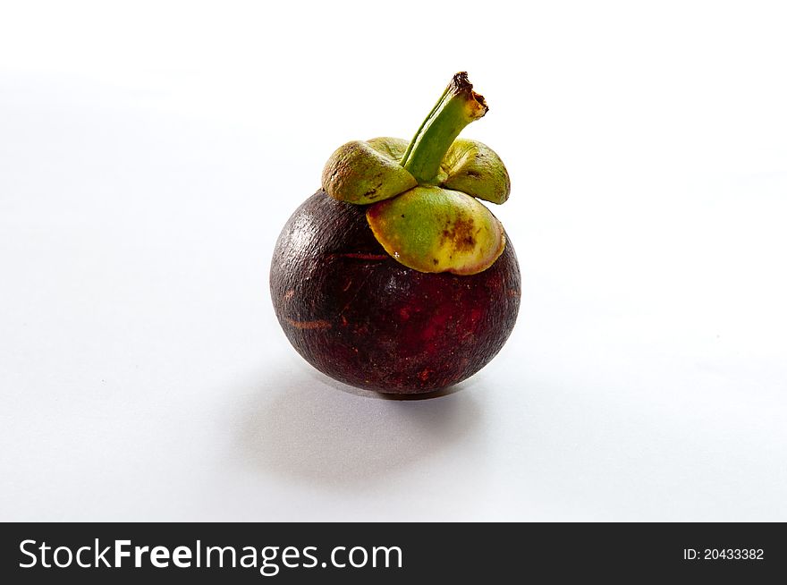 Mangosteen on white background at bangkok