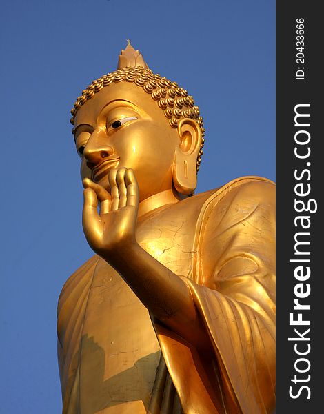 Golden Buddha statue traditional in thailand