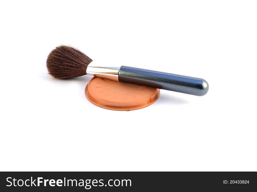 Facial powder and brush isolated on white. Facial powder and brush isolated on white